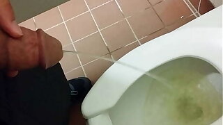 Pissing in another public toilet.